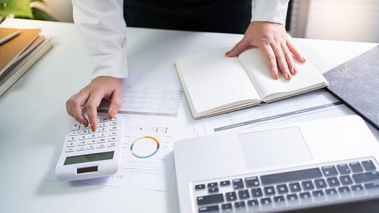 Auditor or internal revenue service staff, Business women checking annual financial statements